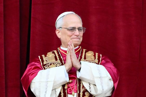 Pope Leo XIV, Robert Prevost arrives on the main central loggia balcony of the St Peter's Basilica for the first time.
